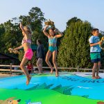 Summer camping fun at Yogi Bear's Jellystone Park in Mill Run PA includes making new friends on our jumping pillow