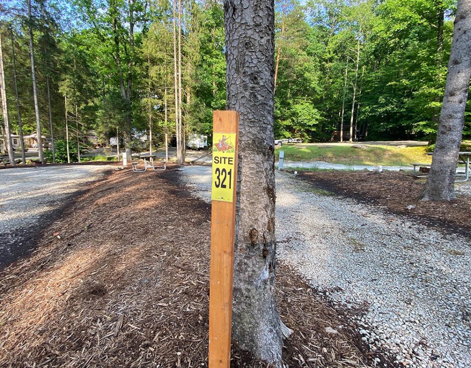 Family planning a summer camping trip at Jellystone Park Mill Run